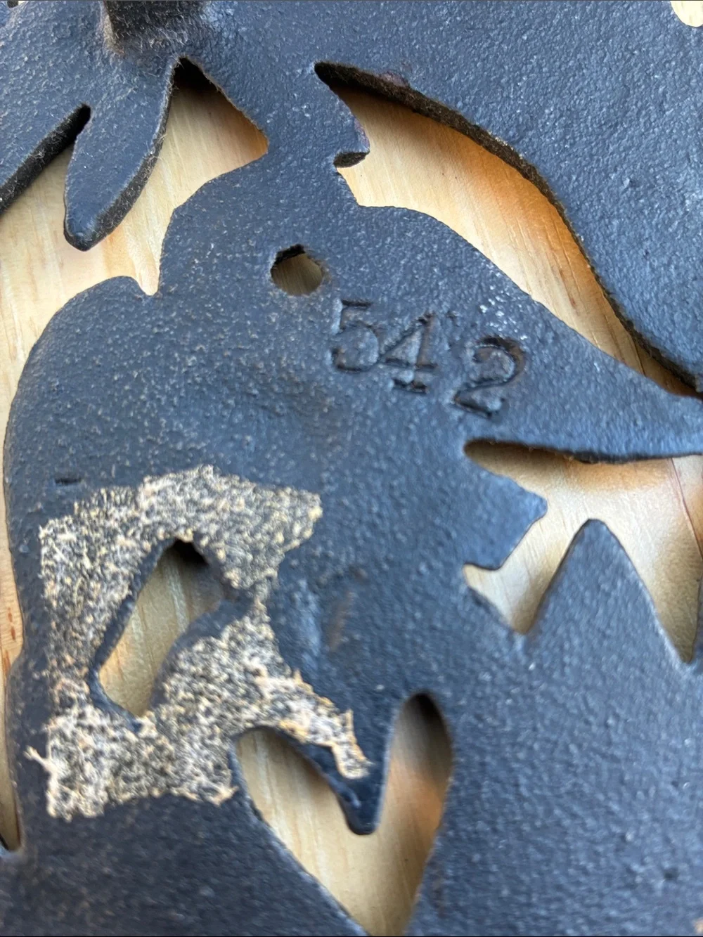 Cast Iron trivet. Eagle. Heart leaves vintage